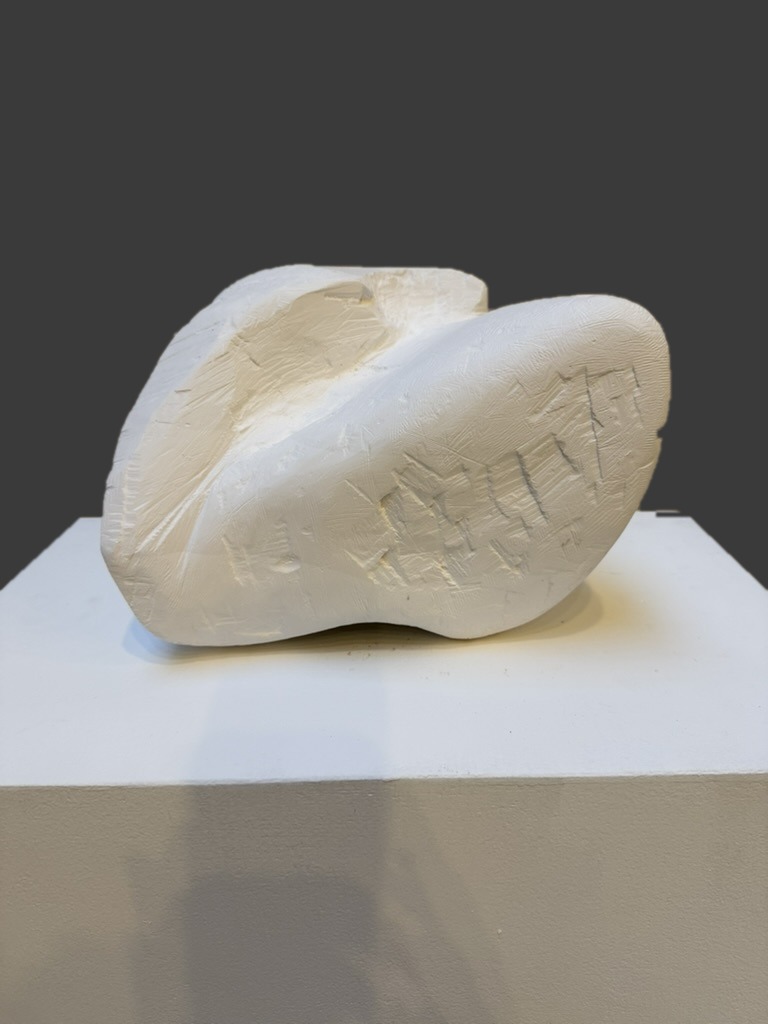 Still Life: They, carved plaster on a plinth